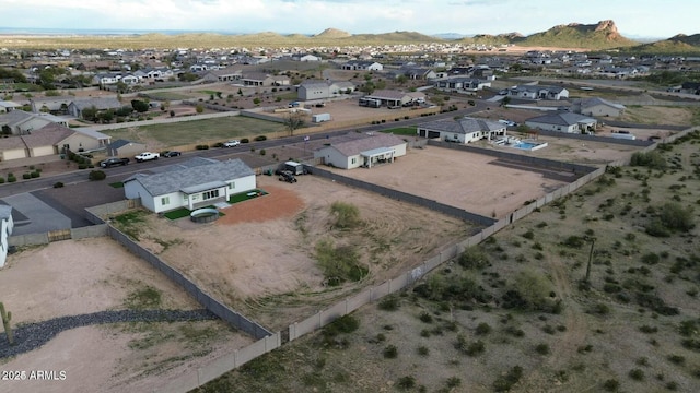 birds eye view of property featuring a residential view and a mountain view