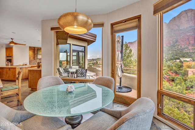 dining room featuring a ceiling fan
