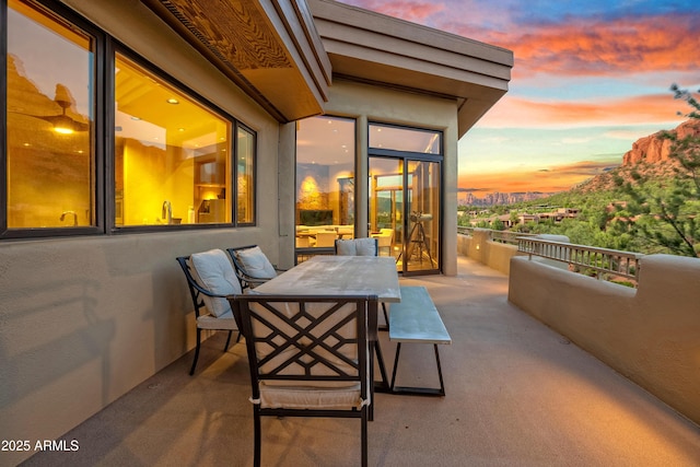 balcony with outdoor dining area