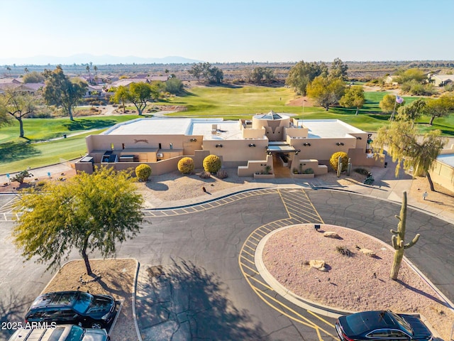 birds eye view of property with a mountain view