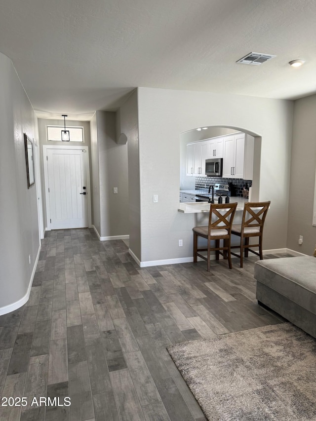 foyer featuring dark hardwood / wood-style flooring