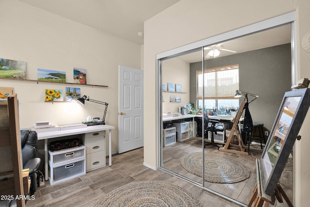 office space with ceiling fan and wood-type flooring