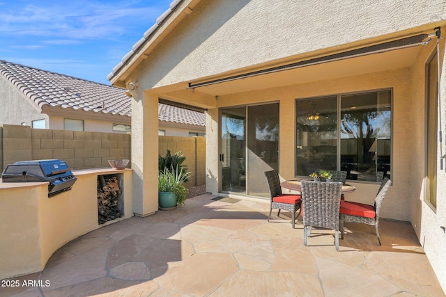 view of patio / terrace with area for grilling