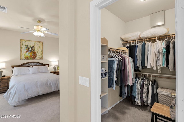 bedroom featuring carpet flooring, ceiling fan, and a closet