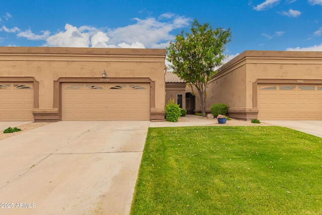 19812 N 90th Dr, Peoria, AZ 85382 - southwest-style home with a front lawn, driveway, and stucco siding
