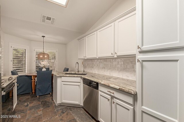 19812 N 90th Dr, Peoria, AZ 85382 - kitchen featuring a sink, electric range oven, stone finish flooring, tasteful backsplash, and dishwasher