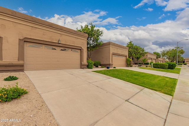 19812 N 90th Dr, Peoria, AZ 85382 - pueblo revival-style home featuring stucco siding and a garage