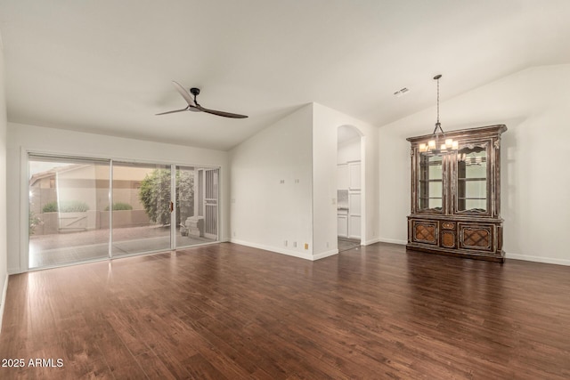 19812 N 90th Dr, Peoria, AZ 85382 - unfurnished living room with a ceiling fan, vaulted ceiling, baseboards, arched walkways, and wood finished floors