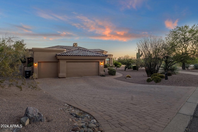 view of front of house with a garage