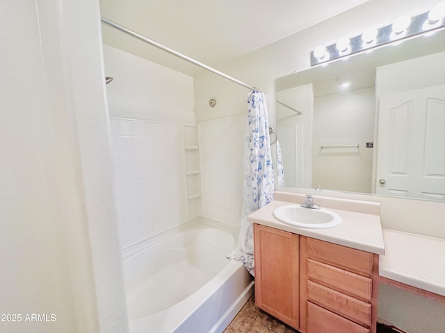 bathroom featuring tile patterned flooring, shower / bath combo, vanity, and a textured ceiling