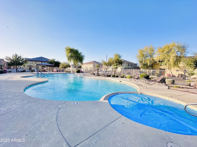 view of swimming pool with a patio area