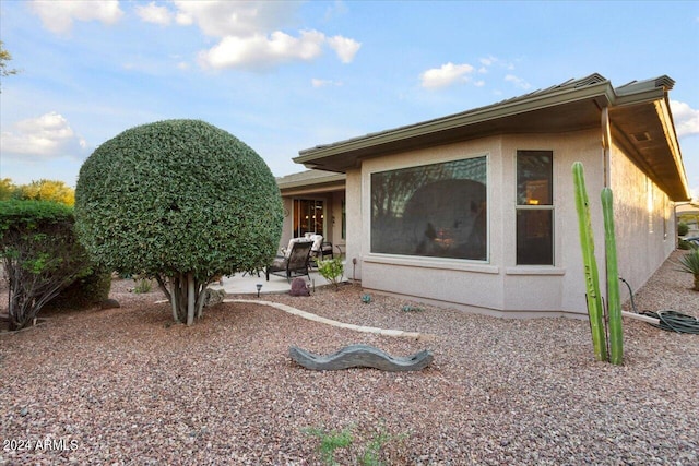 view of front of home with a patio