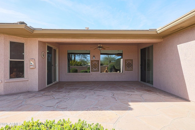 view of patio with ceiling fan