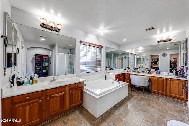 bathroom with vanity and plus walk in shower