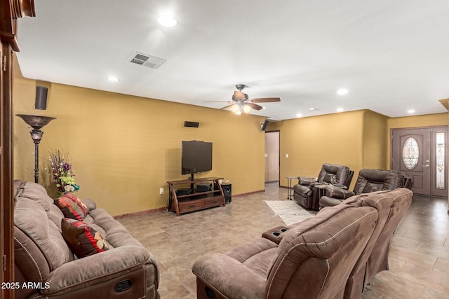 living area with baseboards, visible vents, a ceiling fan, and recessed lighting