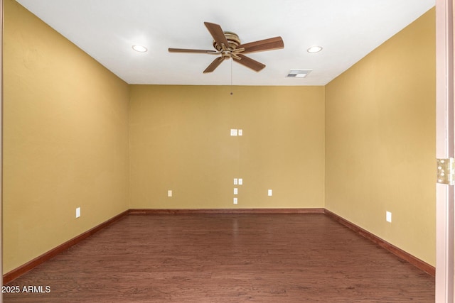 unfurnished room with baseboards, visible vents, ceiling fan, dark wood-type flooring, and recessed lighting