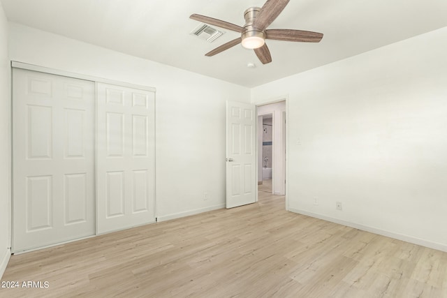 unfurnished bedroom featuring a closet, ceiling fan, and light hardwood / wood-style floors