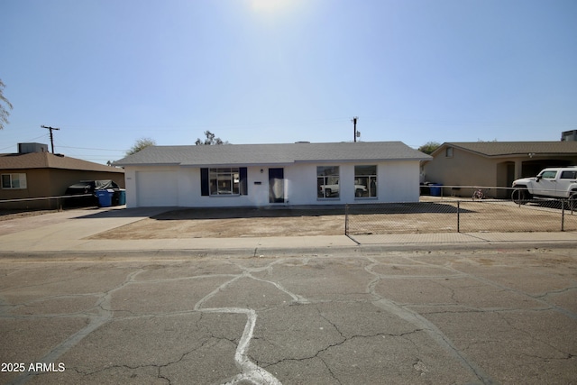 ranch-style house with a garage