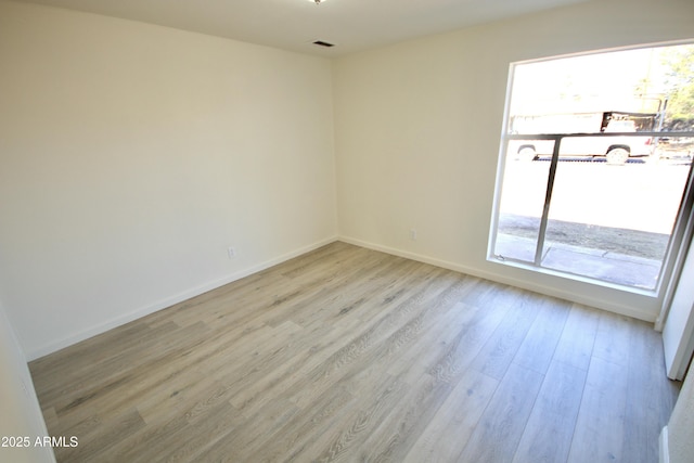 empty room featuring light hardwood / wood-style flooring