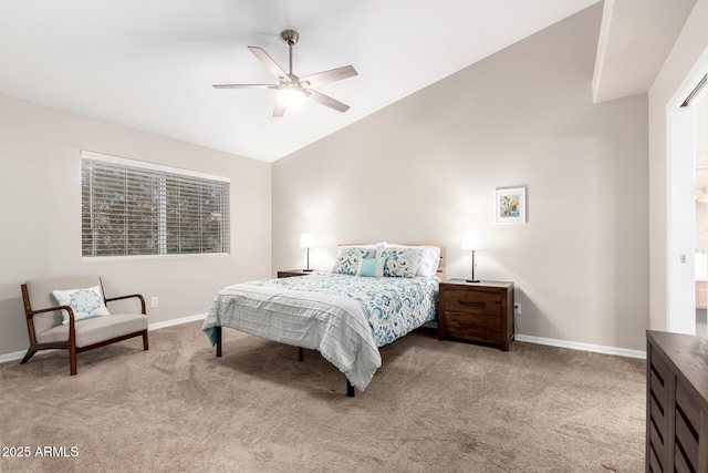 bedroom featuring light colored carpet, vaulted ceiling, and baseboards