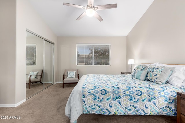 bedroom with baseboards, light colored carpet, ceiling fan, vaulted ceiling, and a closet