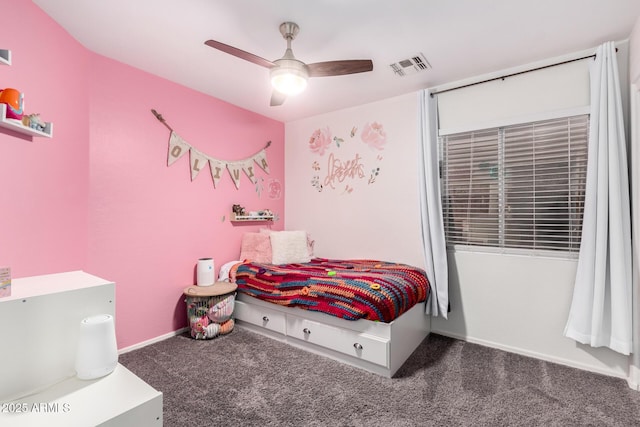 bedroom featuring dark colored carpet and ceiling fan