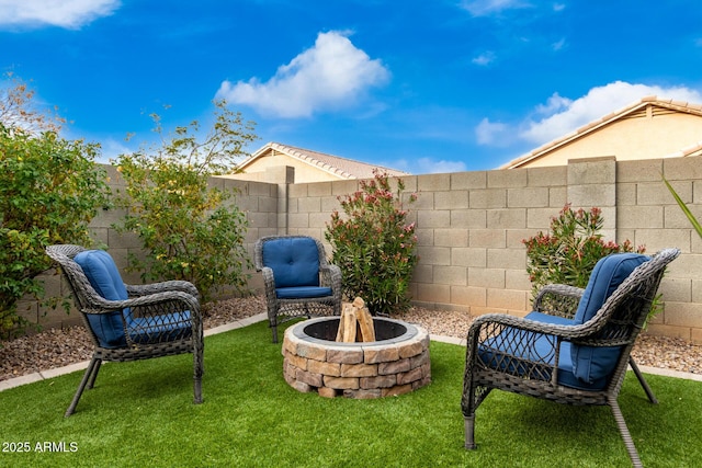 view of patio / terrace with a fire pit