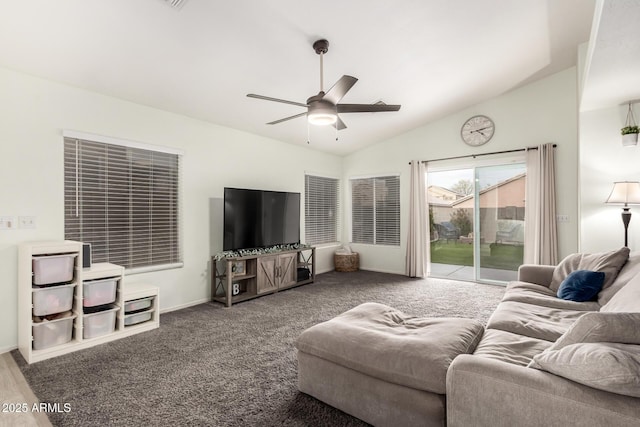 carpeted living room featuring lofted ceiling and ceiling fan