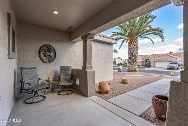 view of patio with visible vents