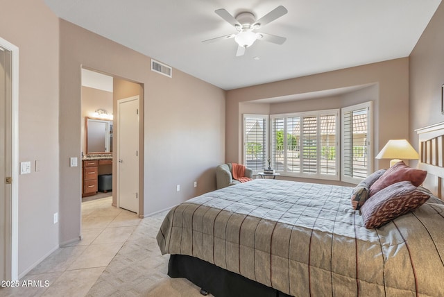 bedroom featuring visible vents, ceiling fan, baseboards, and light tile patterned floors