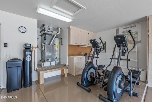 workout room with water heater, attic access, and heating unit