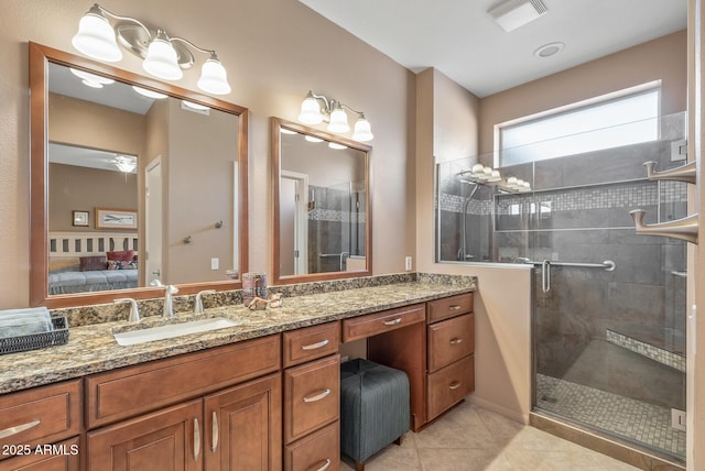 full bath with ensuite bathroom, tile patterned flooring, visible vents, and a shower stall