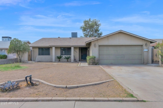 ranch-style house featuring stucco siding, an attached garage, a shingled roof, and driveway