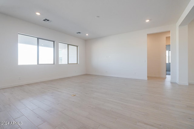 empty room with light wood-type flooring