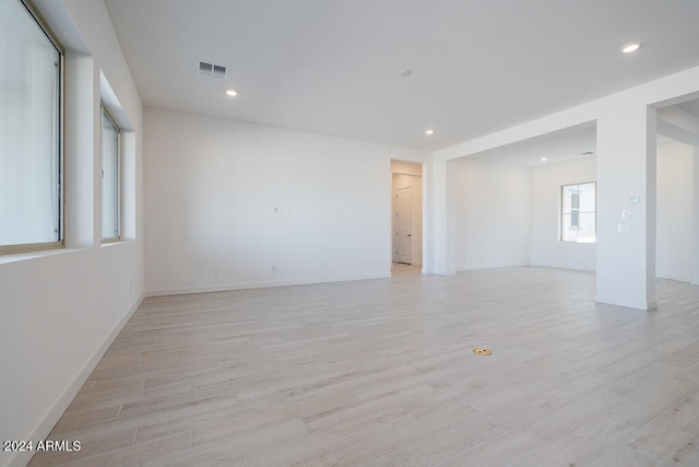 unfurnished room featuring light hardwood / wood-style flooring