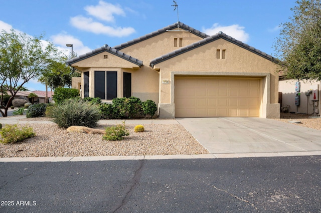 view of front of property with a garage