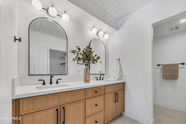 6233 E Pinchot Ave, Scottsdale, AZ 85251 - bathroom with double vanity and wooden ceiling