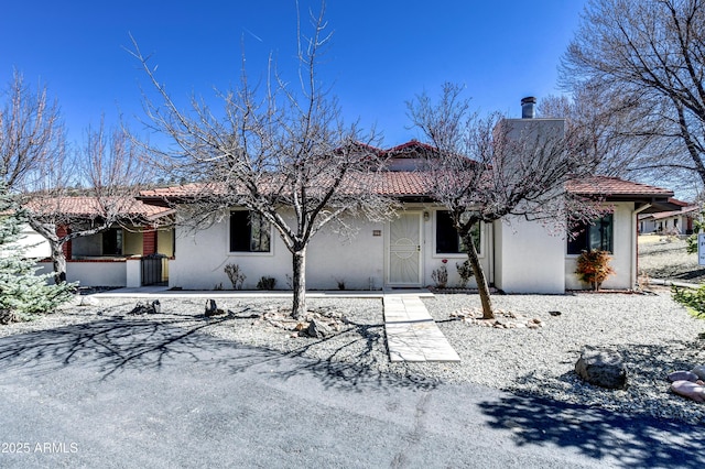 419 Apache Plume Trl, Prescott, AZ 86301 - view of front of property with a tile roof, stucco siding, and a chimney