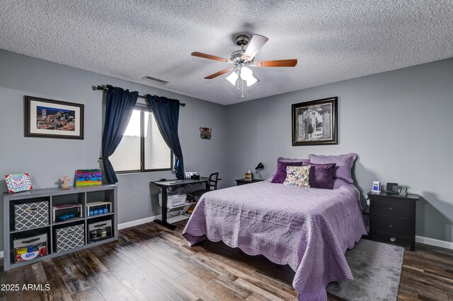 419 Apache Plume Trl, Prescott, AZ 86301 - bedroom featuring visible vents, a textured ceiling, baseboards, and wood finished floors