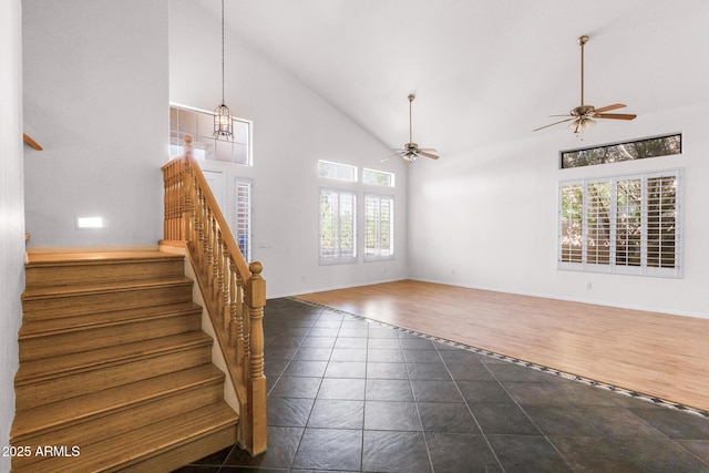 2109 W Wildhorse Dr, Chandler, AZ 85286 - stairs with a ceiling fan, high vaulted ceiling, and a chandelier