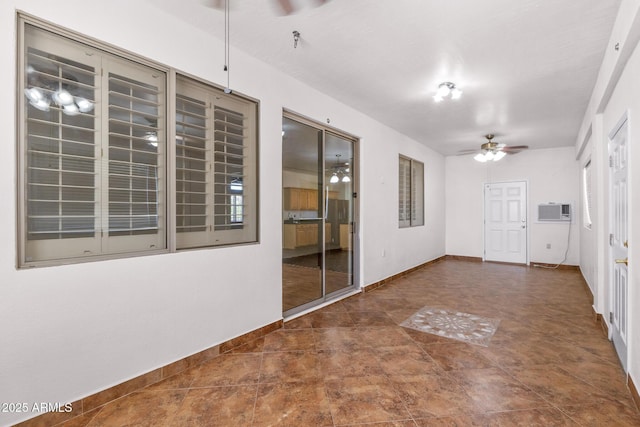 2109 W Wildhorse Dr, Chandler, AZ 85286 - spare room featuring a ceiling fan and an AC wall unit