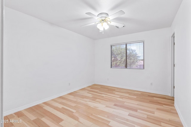 2109 W Wildhorse Dr, Chandler, AZ 85286 - empty room featuring light wood finished floors and a ceiling fan