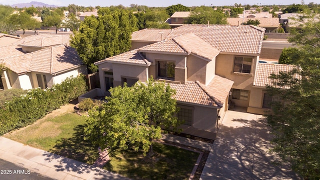 2109 W Wildhorse Dr, Chandler, AZ 85286 - mediterranean / spanish house with stucco siding, a tile roof, and a residential view