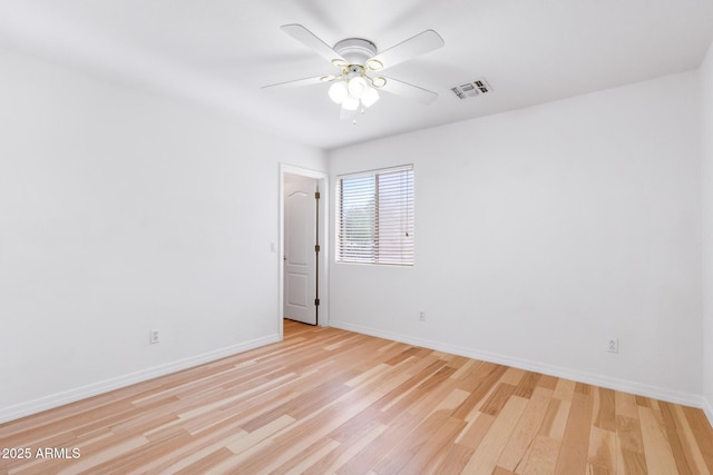 2109 W Wildhorse Dr, Chandler, AZ 85286 - spare room with light wood-type flooring and a ceiling fan