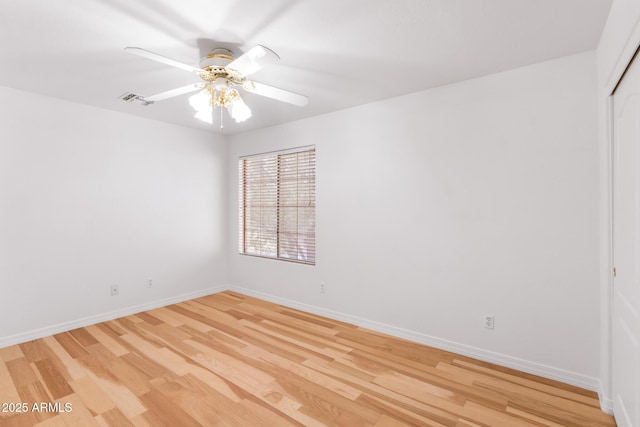 2109 W Wildhorse Dr, Chandler, AZ 85286 - empty room featuring light wood finished floors and a ceiling fan