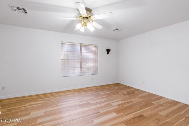 2109 W Wildhorse Dr, Chandler, AZ 85286 - spare room featuring light wood-type flooring and a ceiling fan