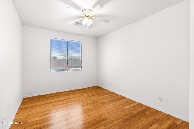 2109 W Wildhorse Dr, Chandler, AZ 85286 - empty room with light wood-type flooring and ceiling fan