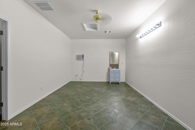 2109 W Wildhorse Dr, Chandler, AZ 85286 - spare room featuring a sink and a wall mounted air conditioner