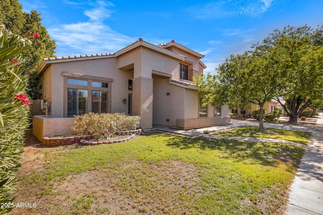 2109 W Wildhorse Dr, Chandler, AZ 85286 - view of front facade with stucco siding and a front lawn