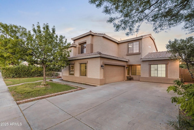 2109 W Wildhorse Dr, Chandler, AZ 85286 - view of front facade featuring a tile roof, stucco siding, driveway, and a garage